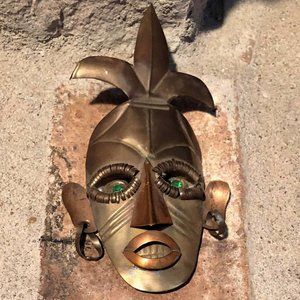 Vintage Mexican mini metal tribal mask